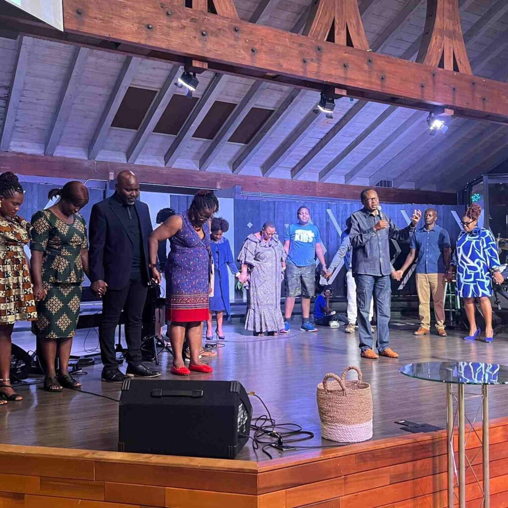 congregants of Upendo Church on a stage